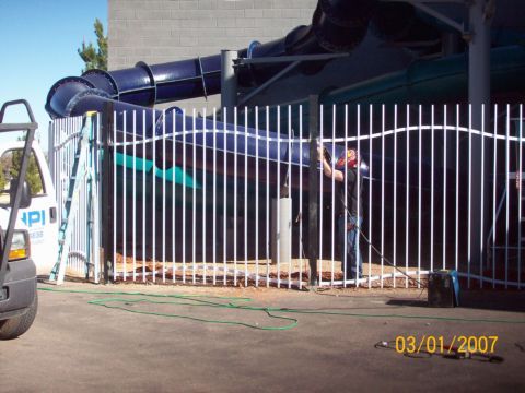 Installing North fence at The Cove